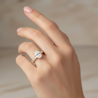 LADIES RING 2 1/2CT ROUND/BAGUETTE/OVAL DIAMOND 14K YELLOW GOLD (CENTER STONE OVAL DIAMOND 2.00CT)