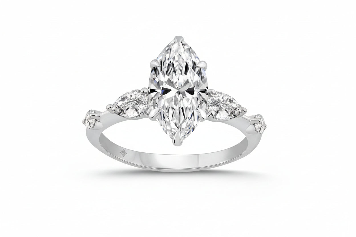 14K WHITE GOLD 2 1/2CT ROUND/MARQUISE/PEAR DIAMOND LADIES RING (CENTER STONE MARQUISE DIAMOND 2CT)