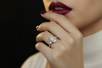 14K WHITE GOLD 2 1/2CT ROUND/MARQUISE/PEAR DIAMOND LADIES RING (CENTER STONE MARQUISE DIAMOND 2CT)
