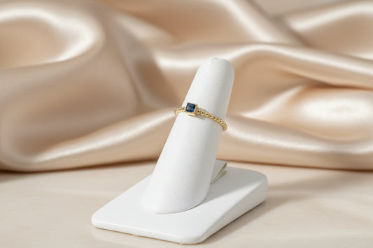 10k Yellow Gold Beadded Band with Blue Topaz Princess Cut Birthstone  Ring